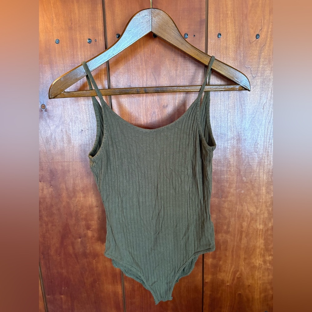 Ribbed olive colored body suit. Size medium.